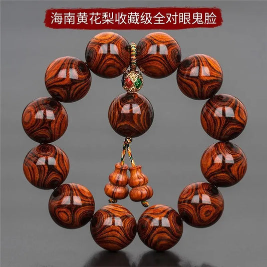 Hainan Sea-Yellowwood Bracelet — Ghost-Eye Grain Carving