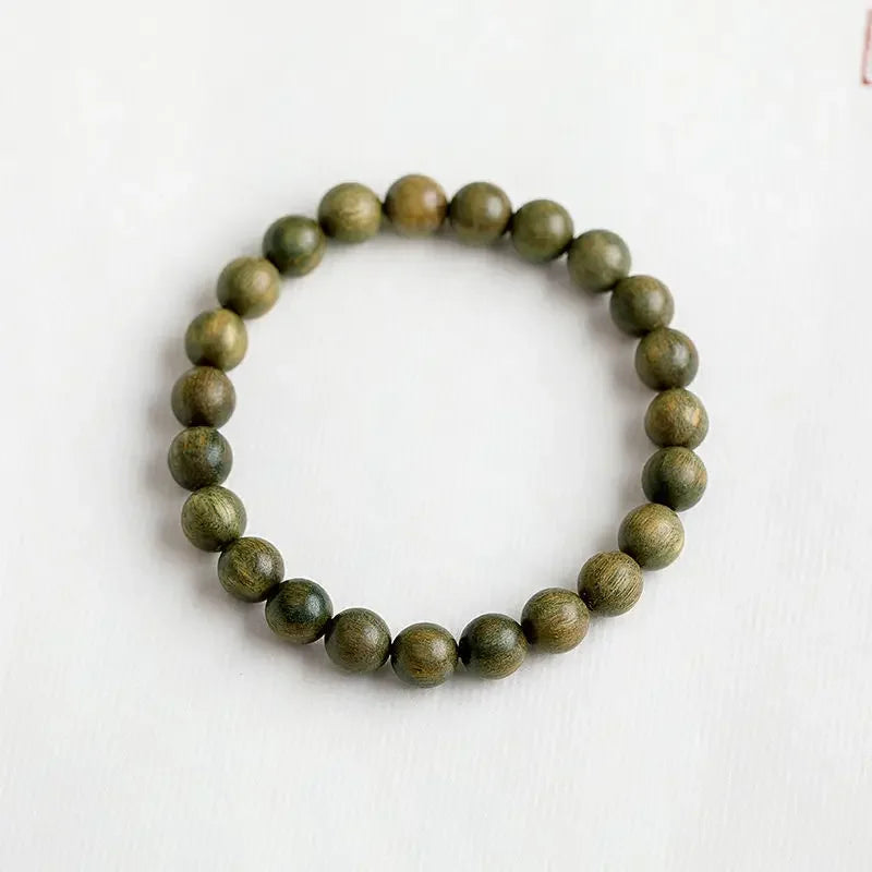 Green Sandalwood Lotus Cinnabar Bracelet — Wealth & Blessing