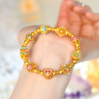 Flowing Color Four-Leaf Clover Gold Sand Fortune Bead Bracelet – Lucky Charm for Women