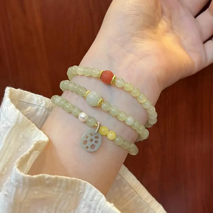 Hetian Jade Multi-Row Bracelet – Agate Lotus Pendant