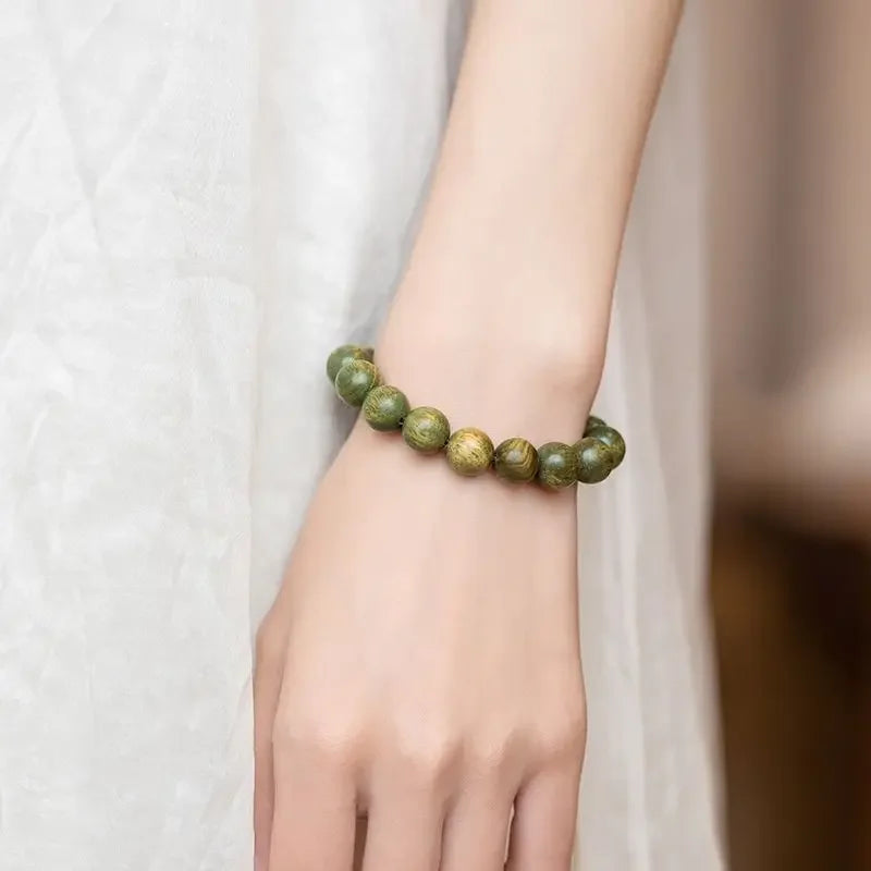 Green Sandalwood Lotus Cinnabar Bracelet — Wealth & Blessing