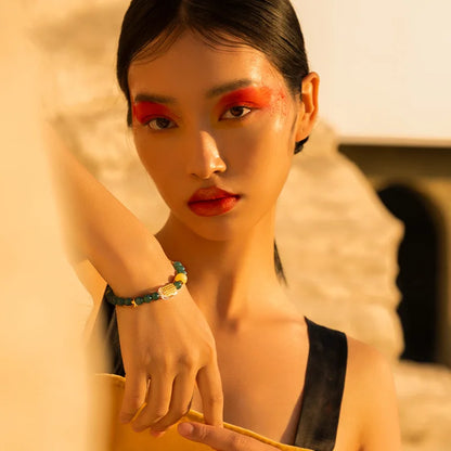 Chicken-Oil Yellow Amber Bracelet with Blue Jade Leaf Inlay