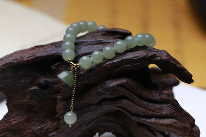 Hetian Jade Lotus Pendant 8mm Round Bead Bracelet — Elegant Charm for Women