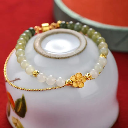 Peach Blossom Hotan Jade Hand-String Bracelet — Romance & Protection