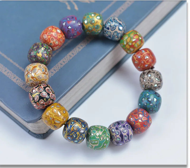 Antique Wood Circle Bracelet with Mother-of-Pearl Luck Charm