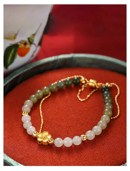 Peach Blossom Hotan Jade Hand-String Bracelet — Romance & Protection