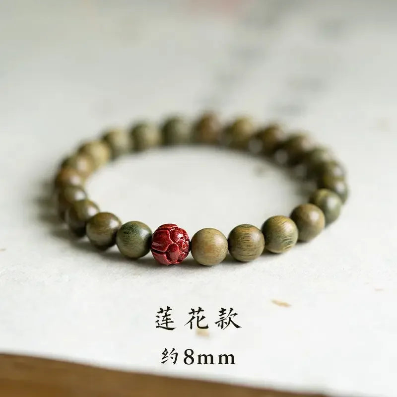Green Sandalwood Lotus Cinnabar Bracelet — Wealth & Blessing