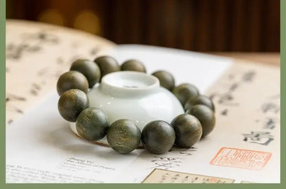 Green Sandalwood Lotus Cinnabar Bracelet — Wealth & Blessing