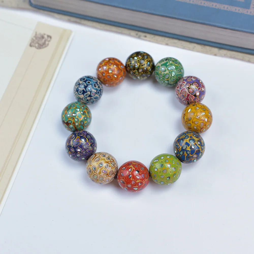 Antique Wood Circle Bracelet with Mother-of-Pearl Luck Charm