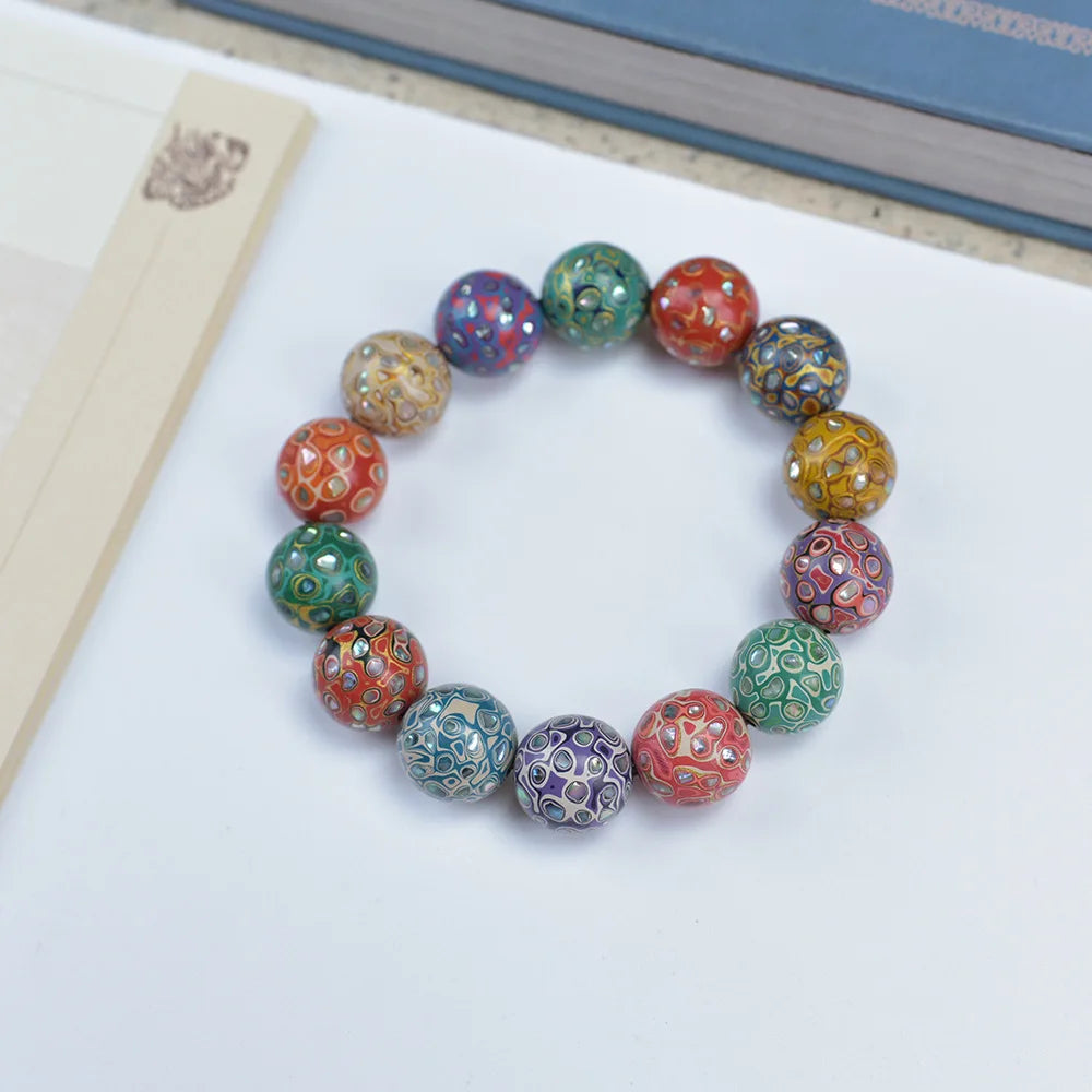 Antique Wood Circle Bracelet with Mother-of-Pearl Luck Charm