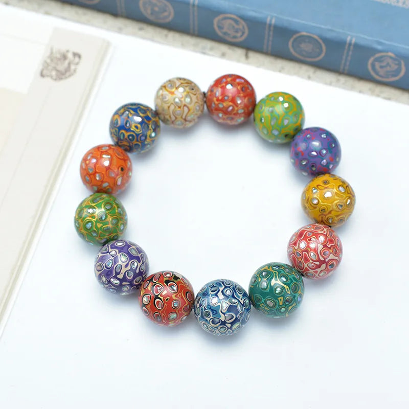 Antique Wood Circle Bracelet with Mother-of-Pearl Luck Charm