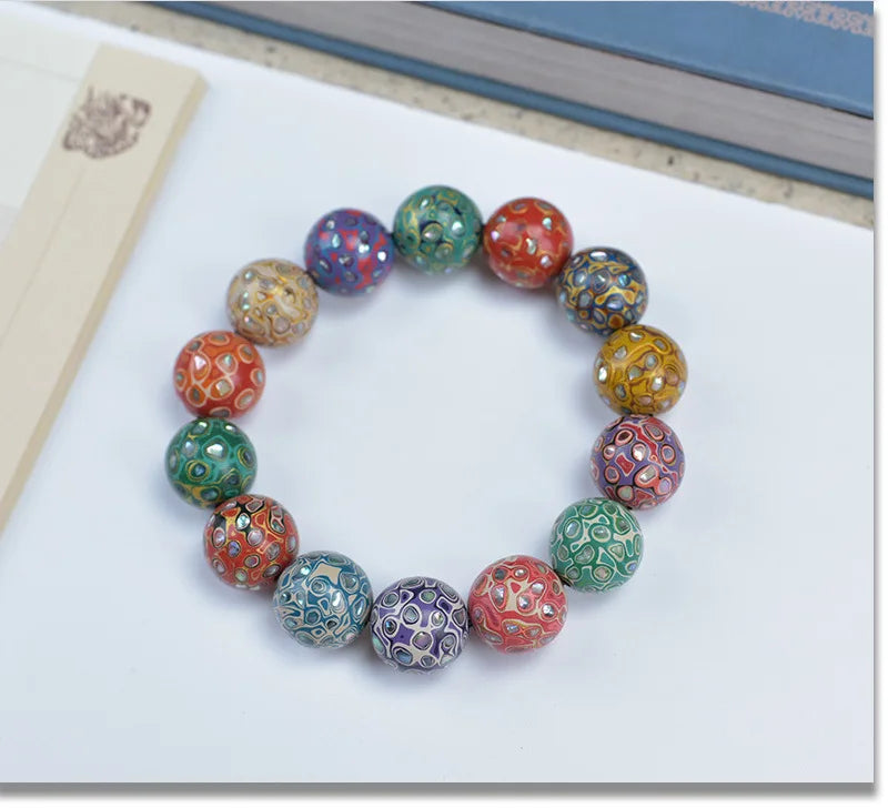 Antique Wood Circle Bracelet with Mother-of-Pearl Luck Charm