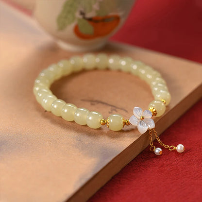 Peach Blossom Pearl & Hetian Jade Hand‑Woven Tassel Bracelet
