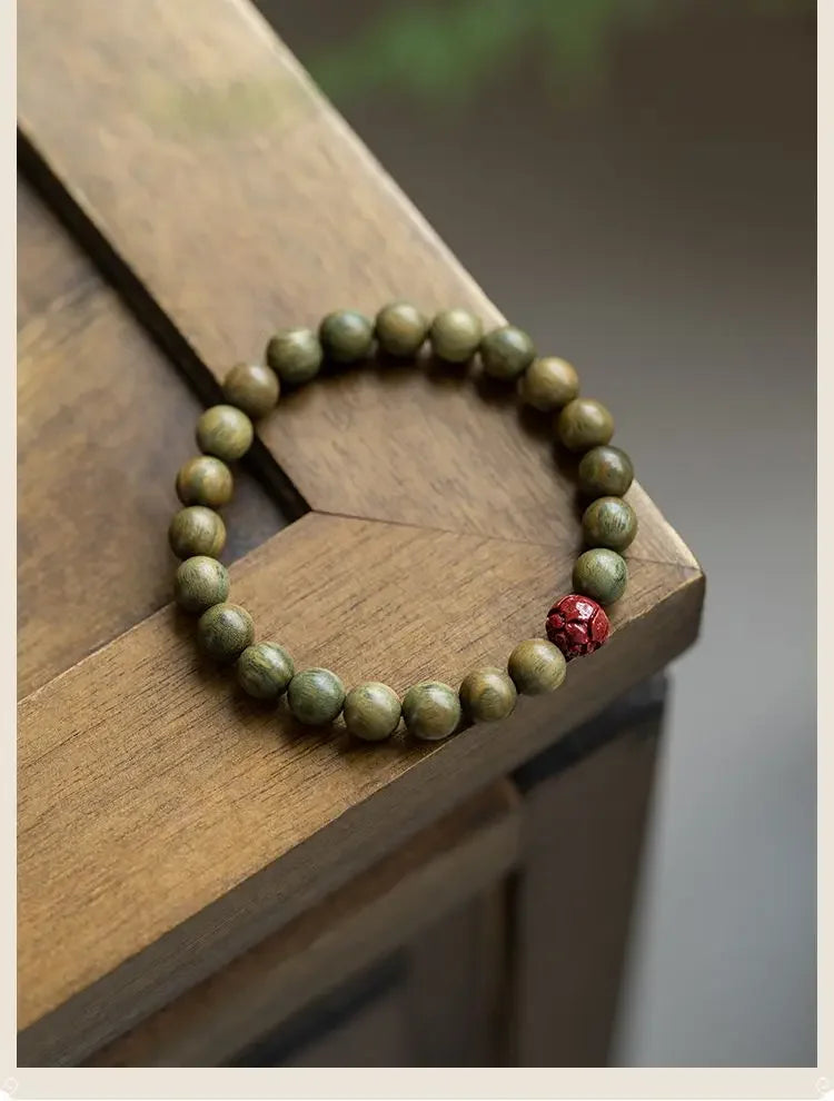 Green Sandalwood Lotus Cinnabar Bracelet — Wealth & Blessing
