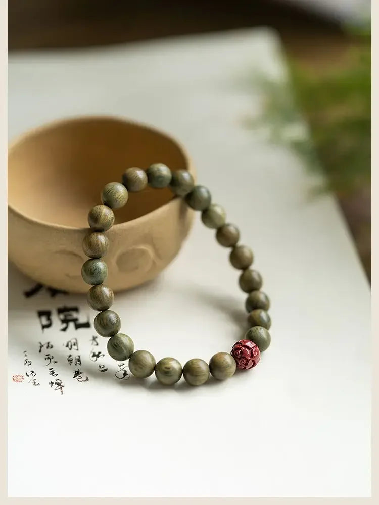 Green Sandalwood Lotus Cinnabar Bracelet — Wealth & Blessing