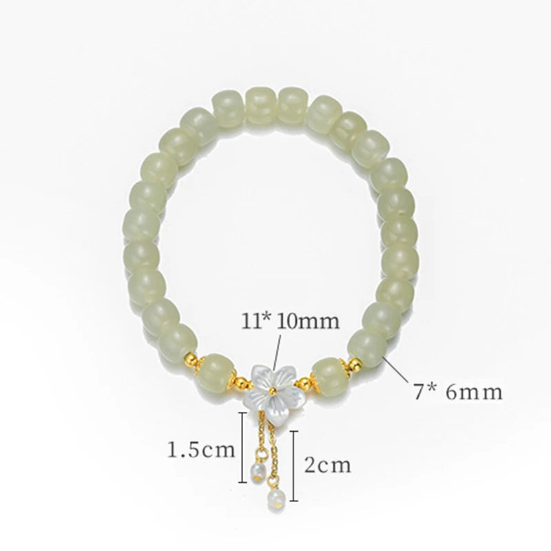Peach Blossom Pearl & Hetian Jade Hand‑Woven Tassel Bracelet
