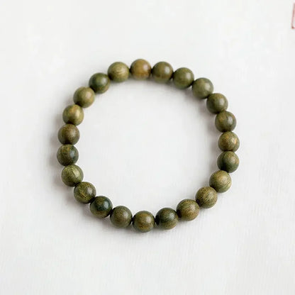 Green Sandalwood Lotus Cinnabar Bracelet — Wealth & Blessing