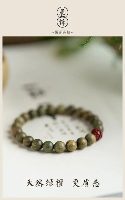 Green Sandalwood Lotus Cinnabar Bracelet — Wealth & Blessing