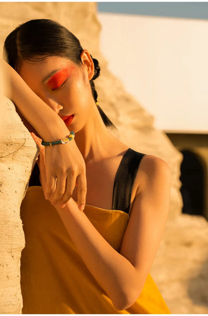 Chicken-Oil Yellow Amber Bracelet with Blue Jade Leaf Inlay