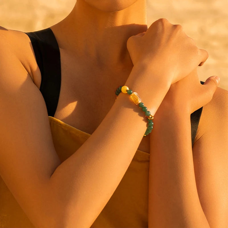 Chicken-Oil Yellow Amber Bracelet with Blue Jade Leaf Inlay