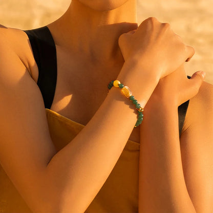 Chicken-Oil Yellow Amber Bracelet with Blue Jade Leaf Inlay