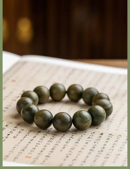Green Sandalwood Lotus Cinnabar Bracelet — Wealth & Blessing