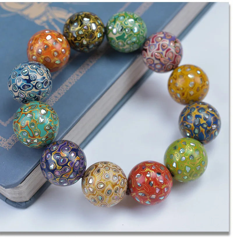 Antique Wood Circle Bracelet with Mother-of-Pearl Luck Charm