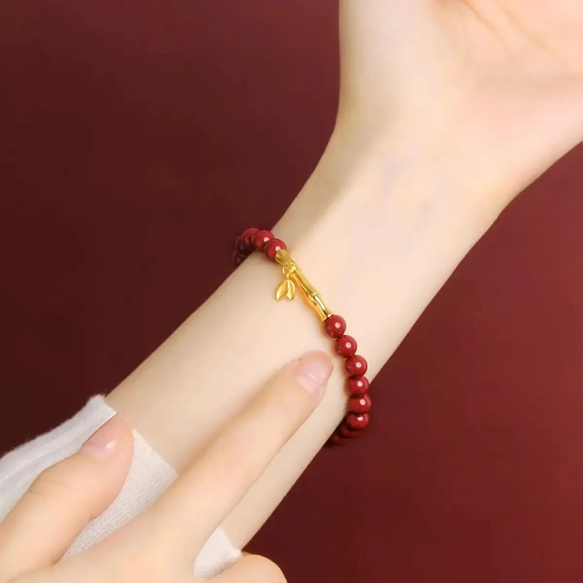 High-Content Cinnabar 6MM Bracelet with 24K Bamboo Charms