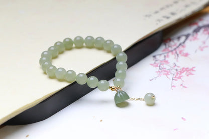 Hetian Jade Lotus Pendant 8mm Round Bead Bracelet — Elegant Charm for Women