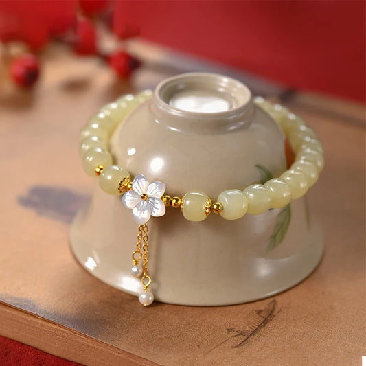Peach Blossom Pearl & Hetian Jade Hand‑Woven Tassel Bracelet