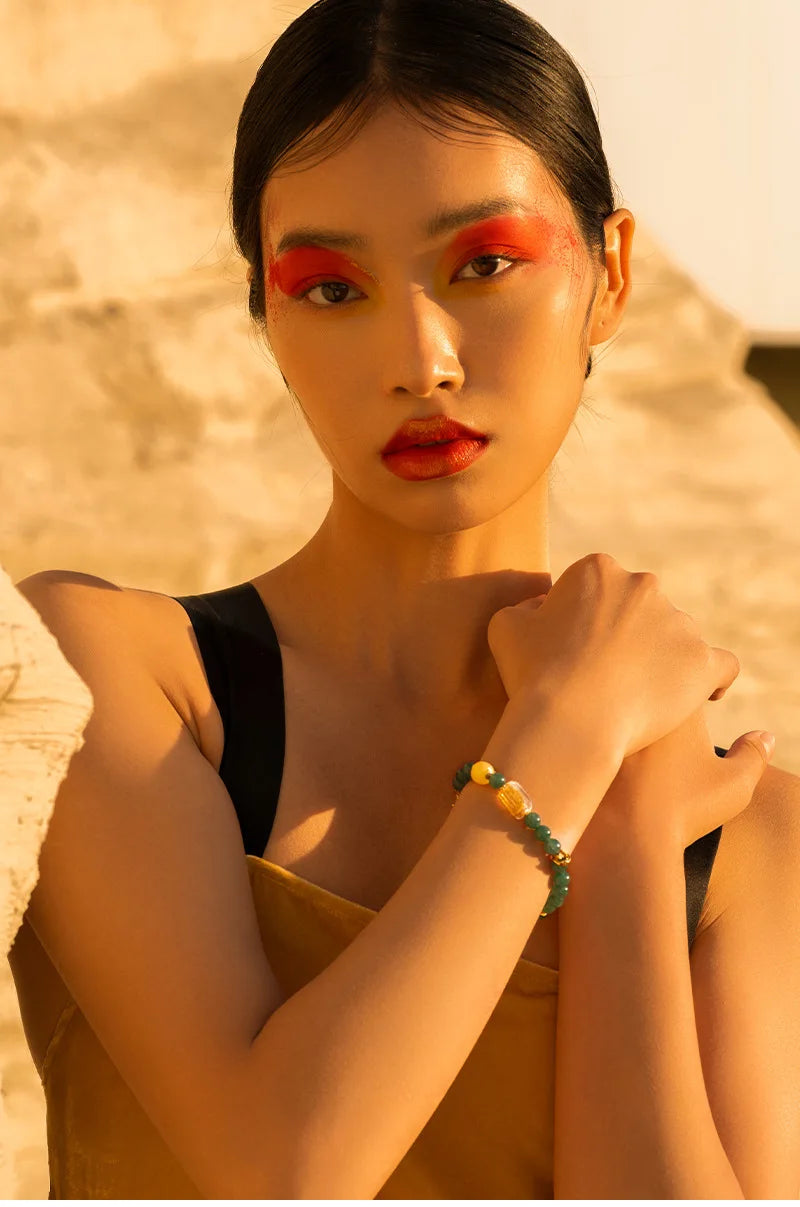 Chicken-Oil Yellow Amber Bracelet with Blue Jade Leaf Inlay