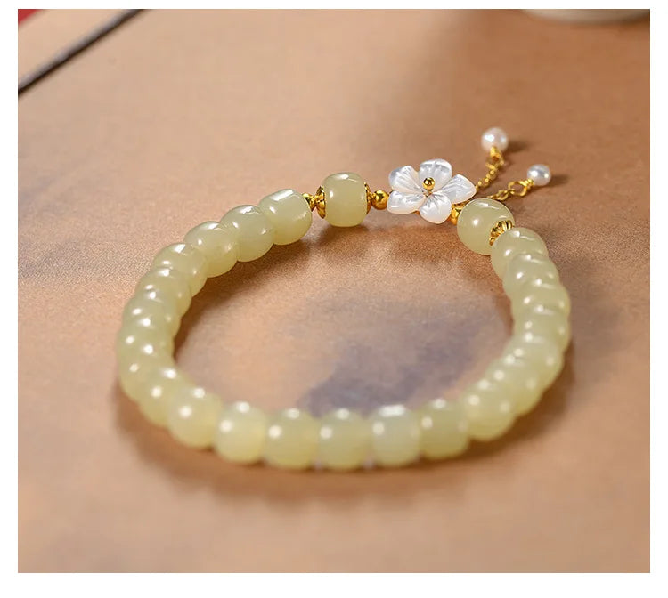 Peach Blossom Pearl & Hetian Jade Hand‑Woven Tassel Bracelet
