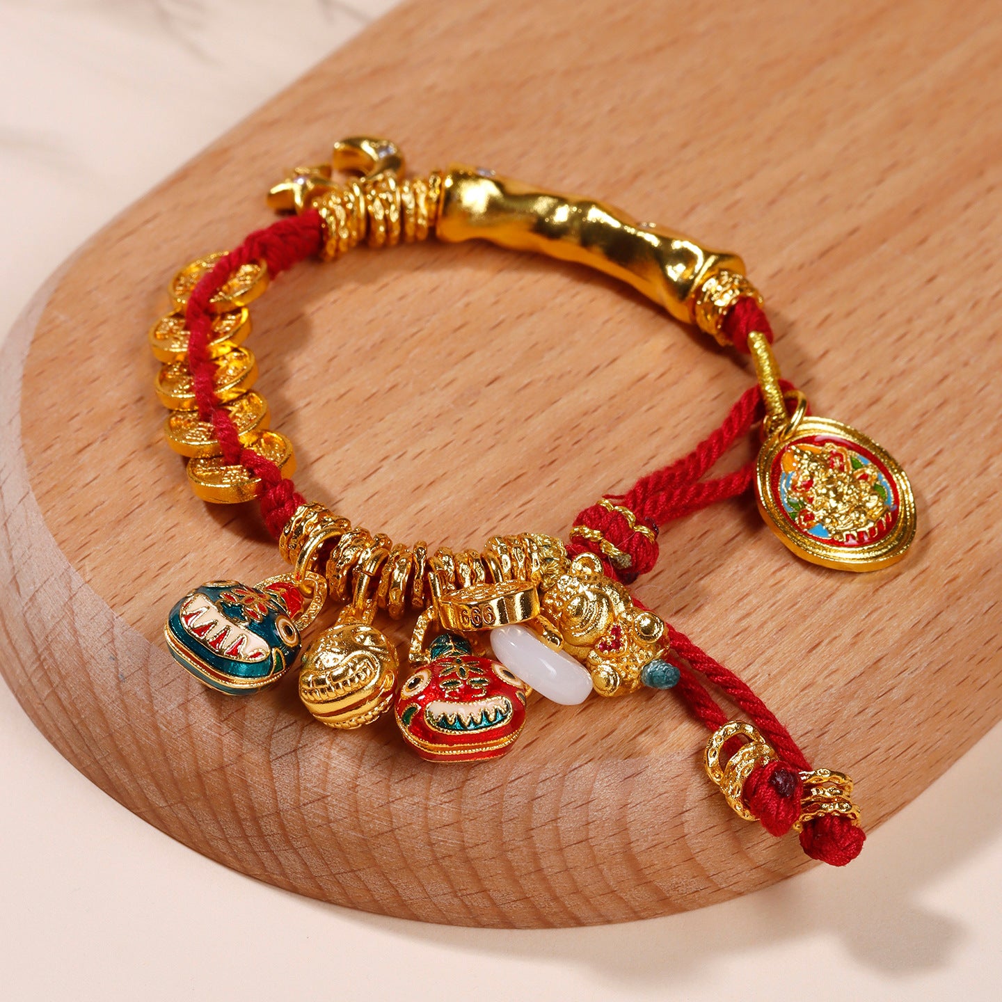 Gold Hammered Tibetan Wealth Bracelet with Five Emperors Money & Coiled Beast Family