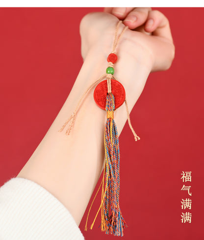 Natural Cinnabar Mountain Ghost Flower Pendant with Tibetan Woven Tassel - Spiritual Protection Bag Charm