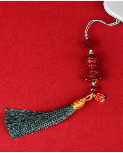 Natural Purple Gold Cinnabar Infant Buddha Charm with Handwoven Tassel for Phone & Bag