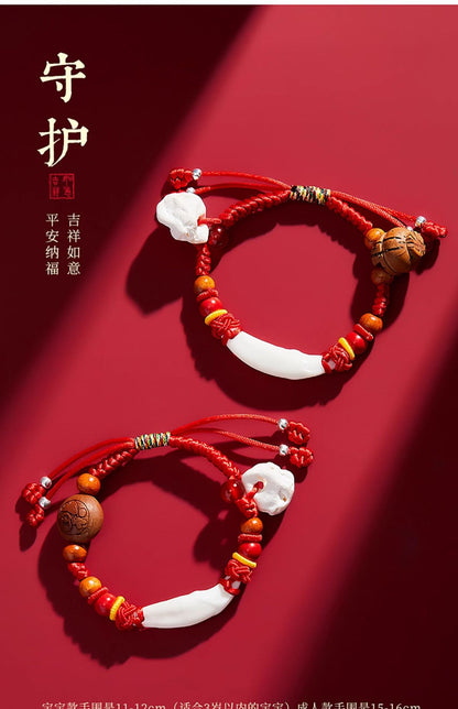 Black Dog Tooth Cinnabar Zodiac Bracelet with Peach Wood Red String for Infant Protection